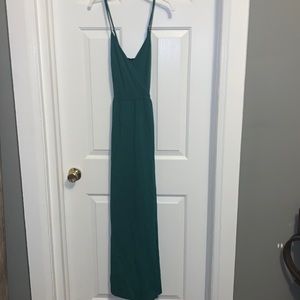 Forest green dress that falls above the ankle.